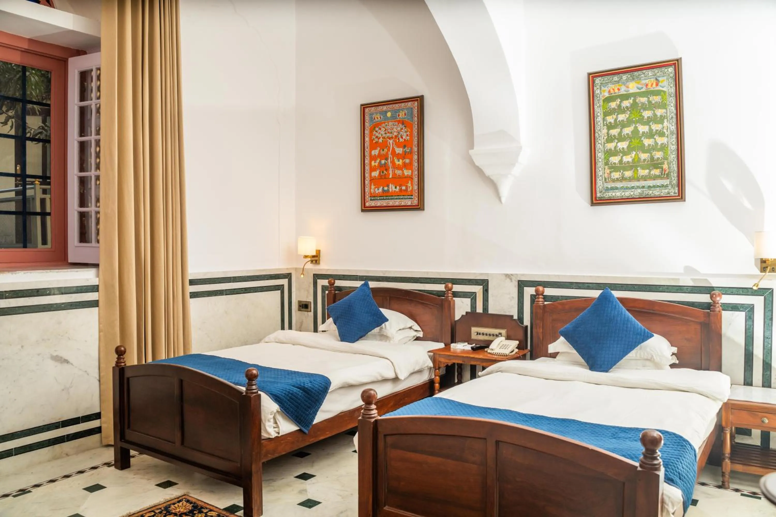 Bed in Hotel Narain Niwas Palace