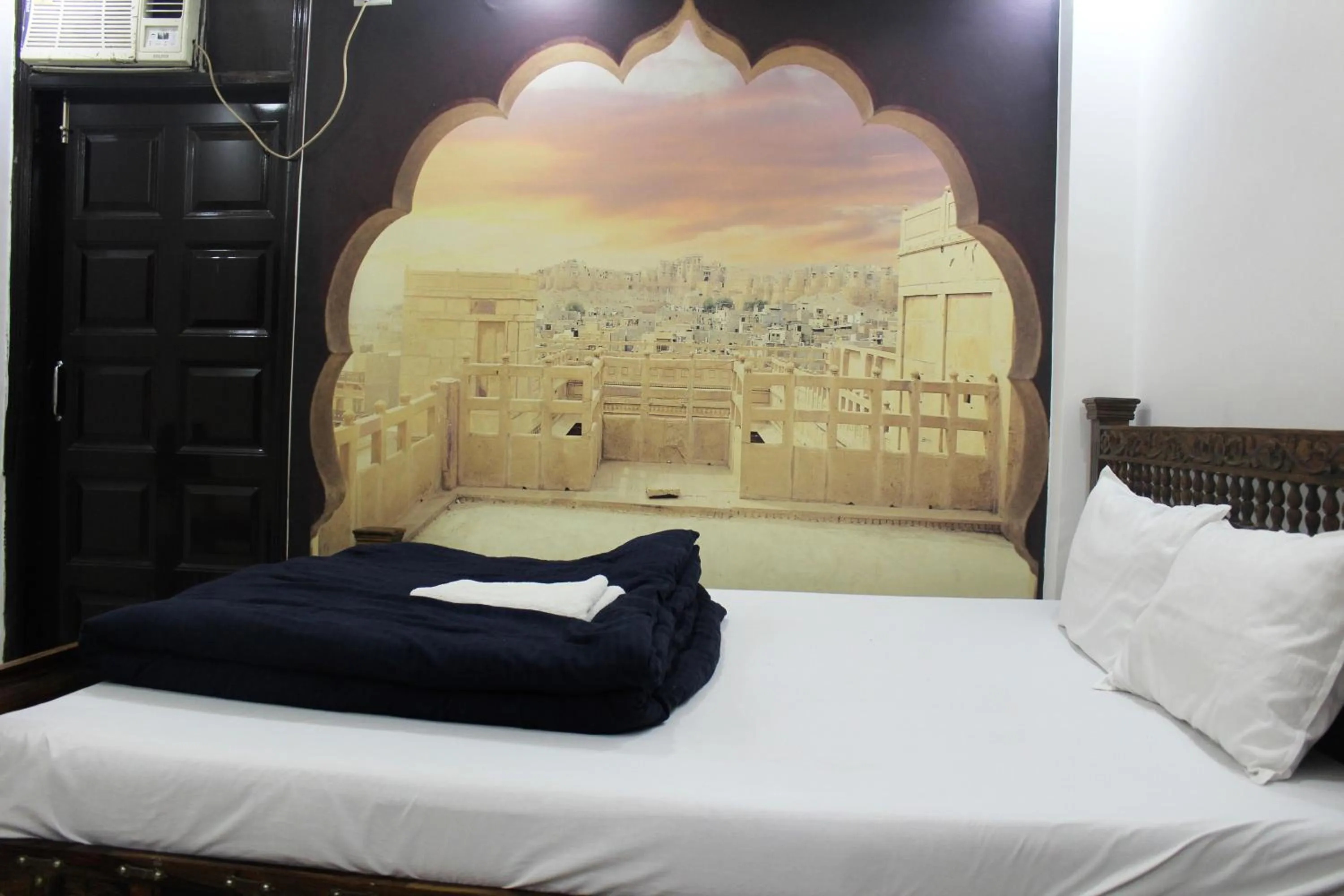 View (from property/room), Bed in Hotel Yes Boss International- Awarded Best Hotel 2025 in Budget Category