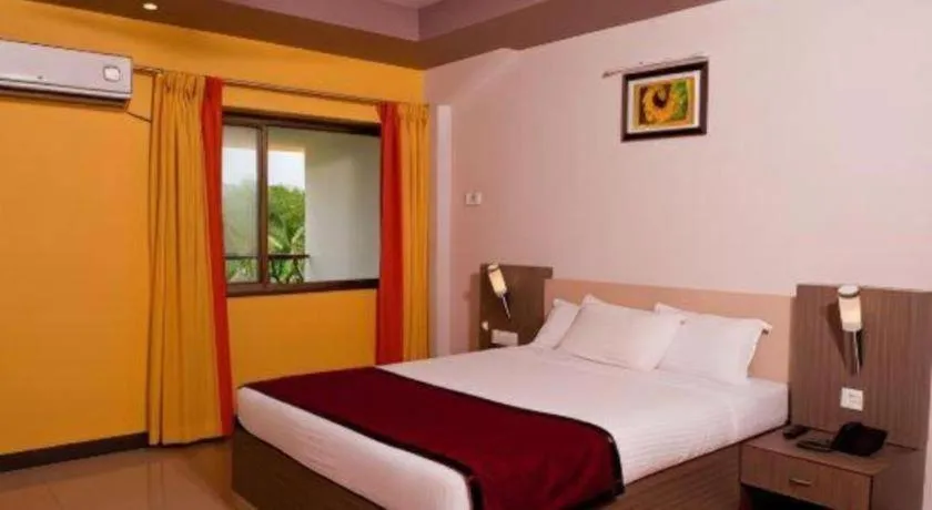 Bed in Hotel Colva Kinara