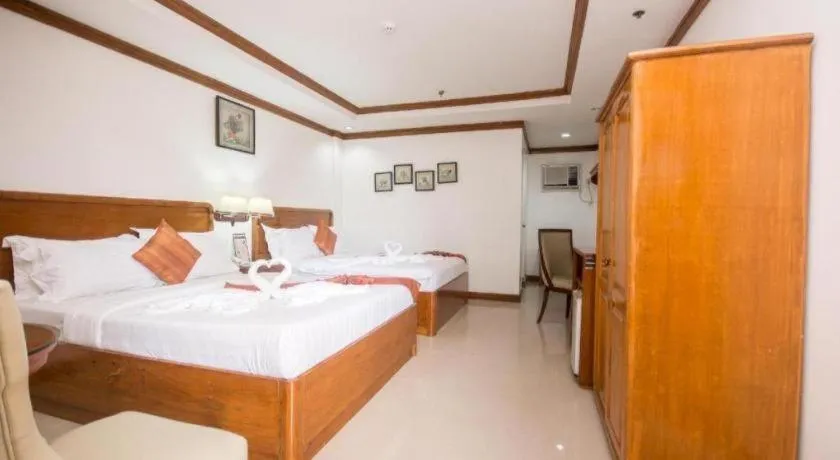 Bed in Grand Boracay Resort