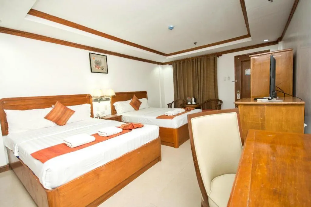 Bed in Grand Boracay Resort