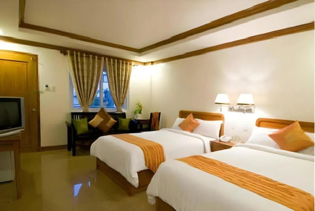 Bed in Grand Boracay Resort