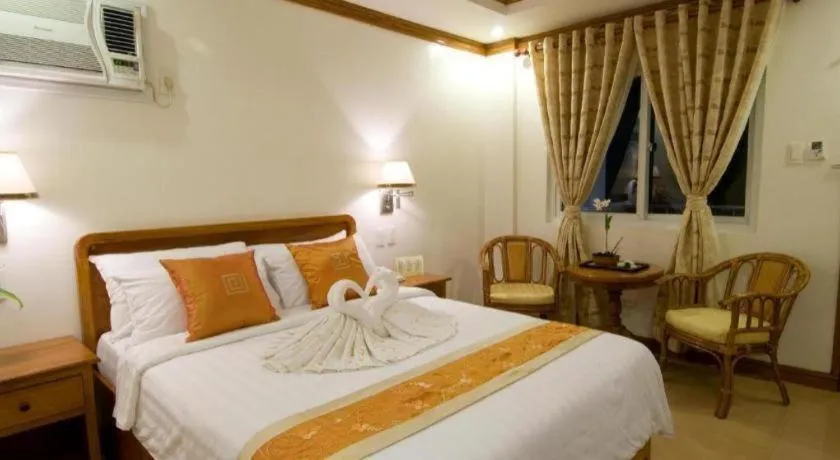 Bed in Grand Boracay Resort
