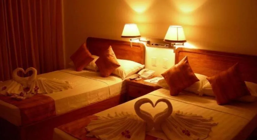 Bed in Grand Boracay Resort