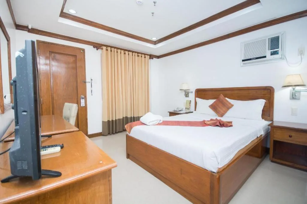 Bed in Grand Boracay Resort