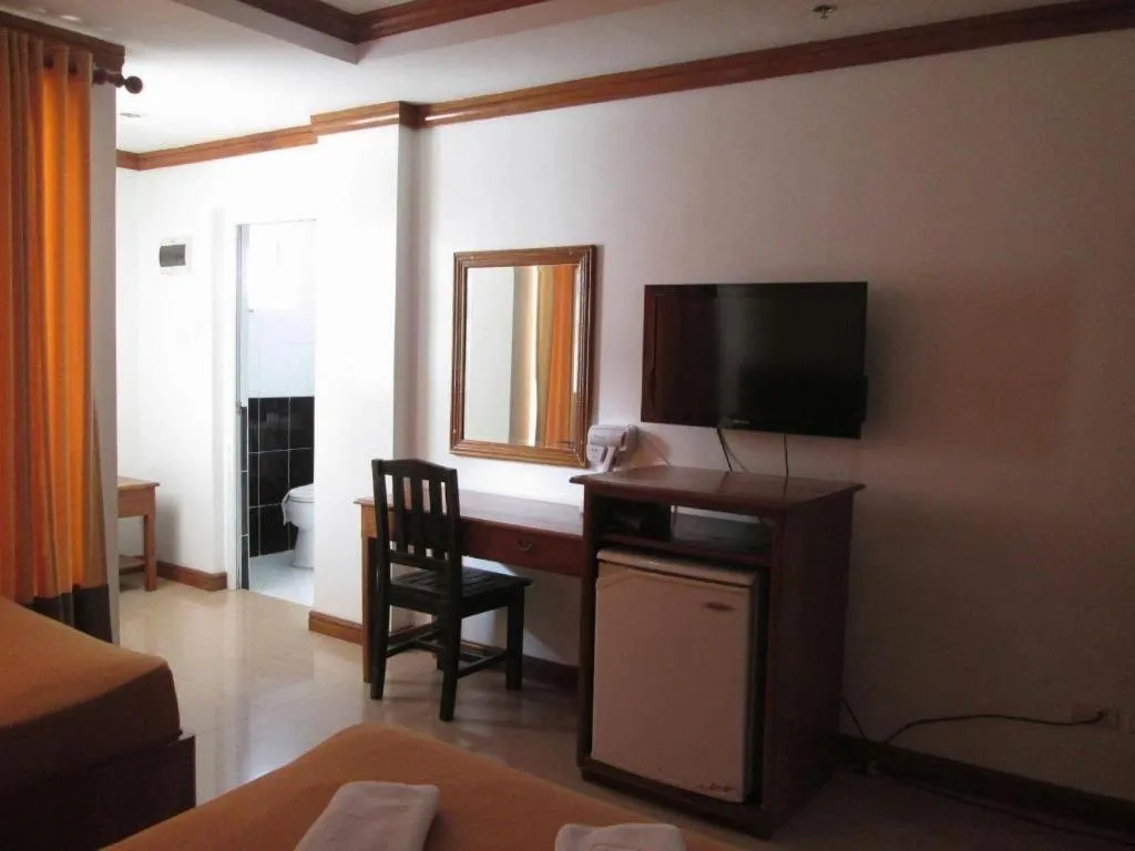 Bed in Grand Boracay Resort