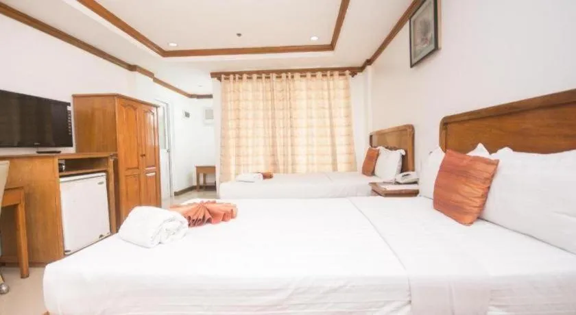 Bed in Grand Boracay Resort