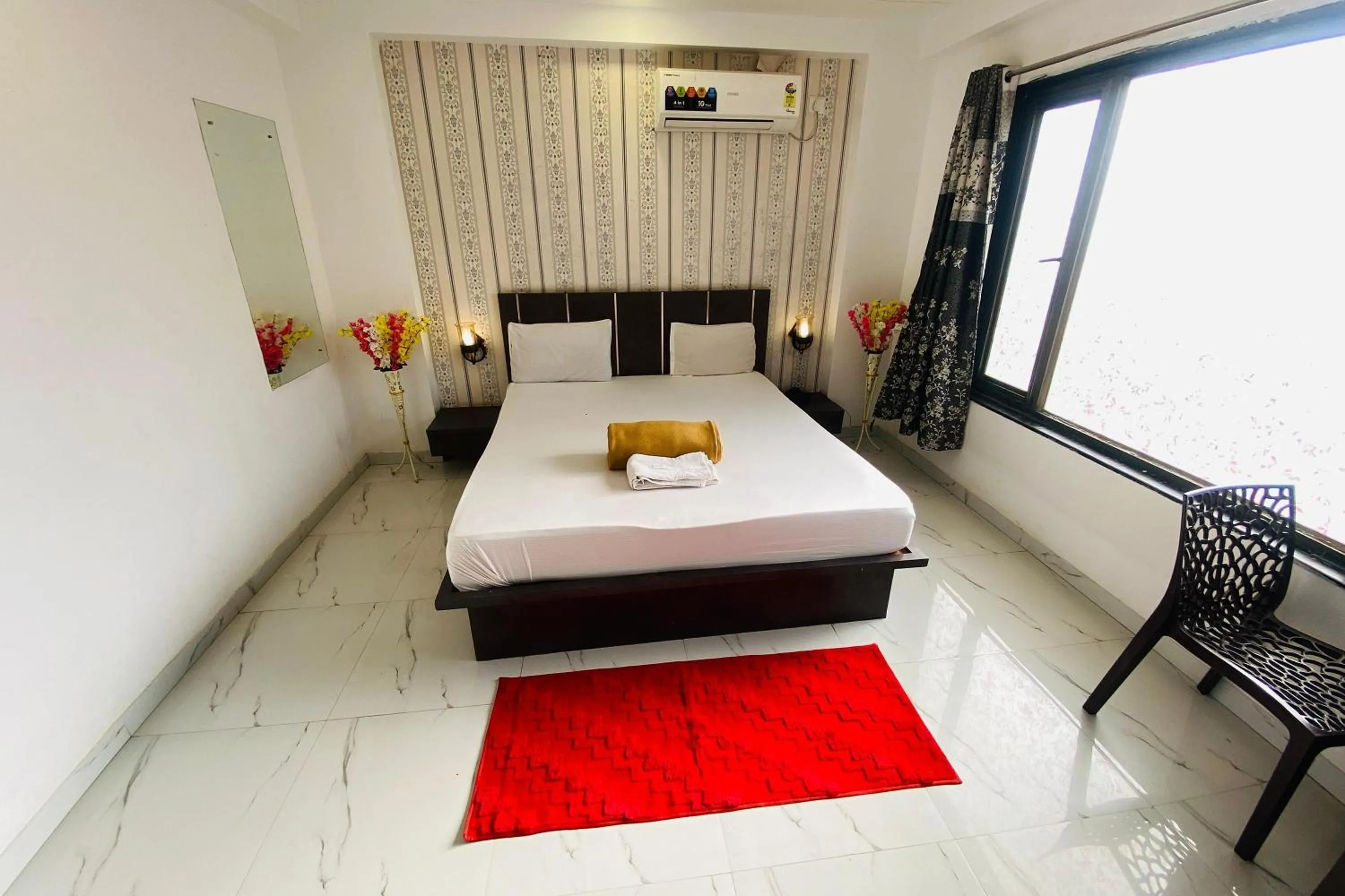 Bed in Sai Vishwa Lodging