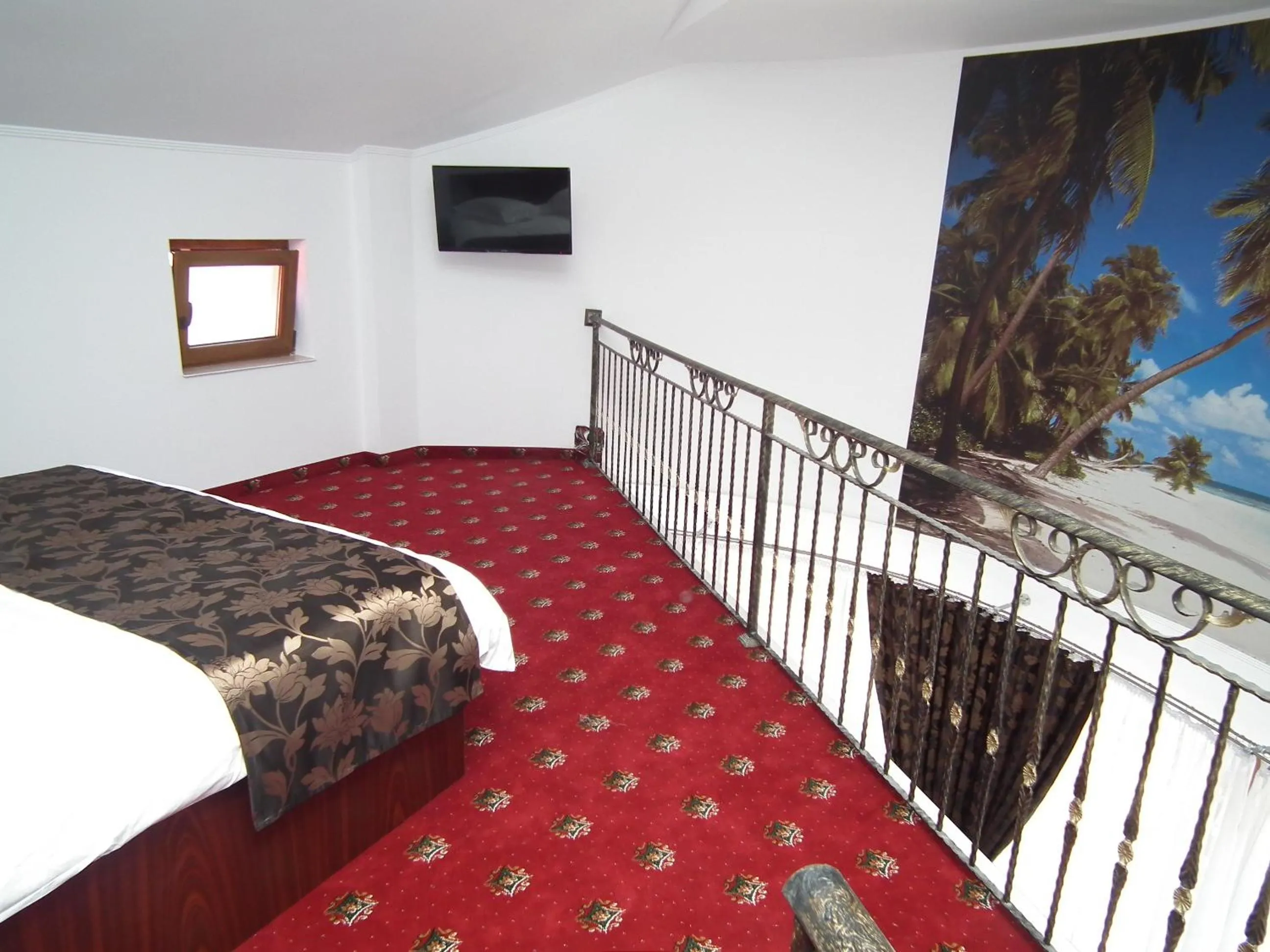 Bed in Vila Queen Mary