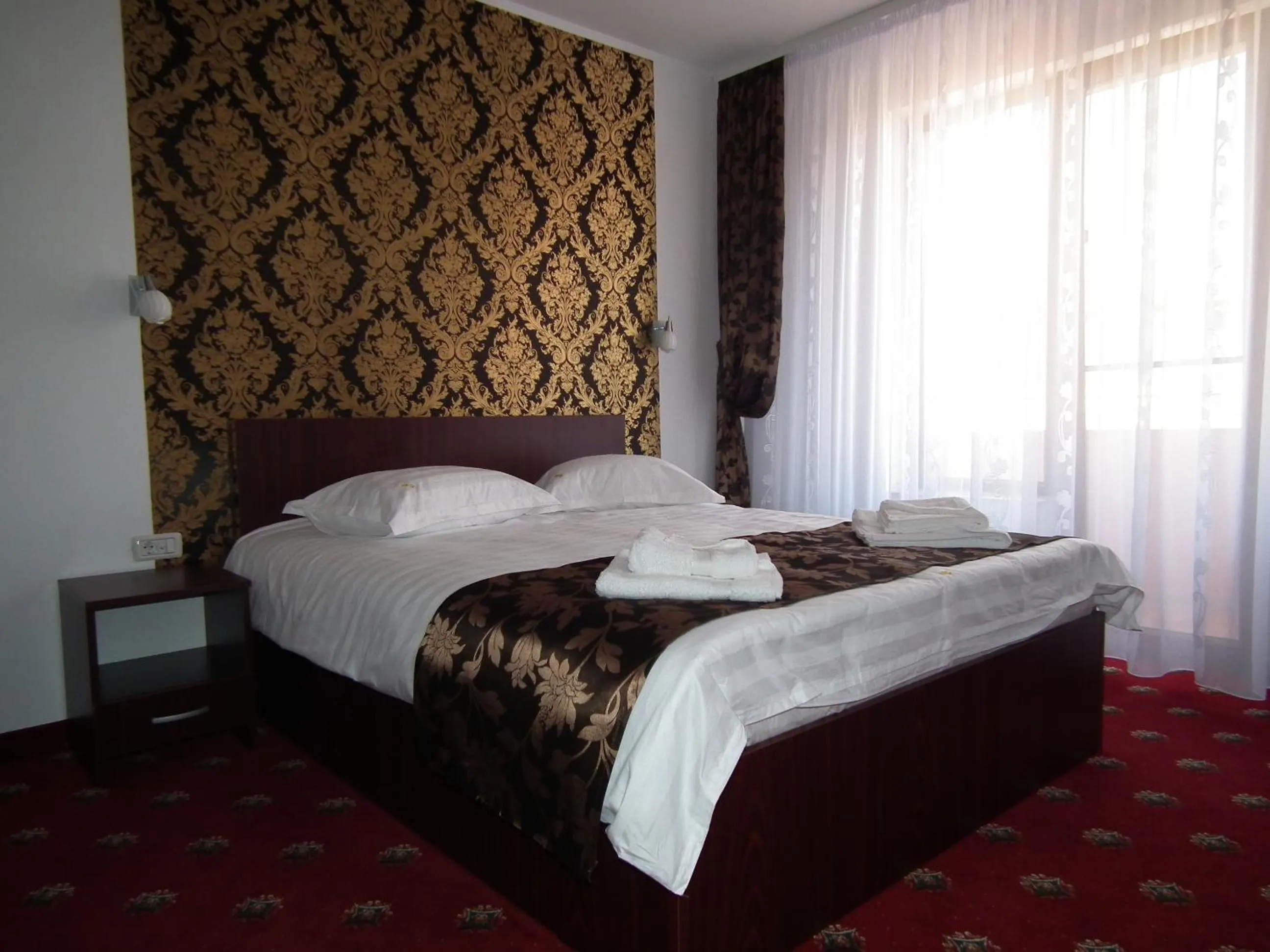 Bed in Vila Queen Mary