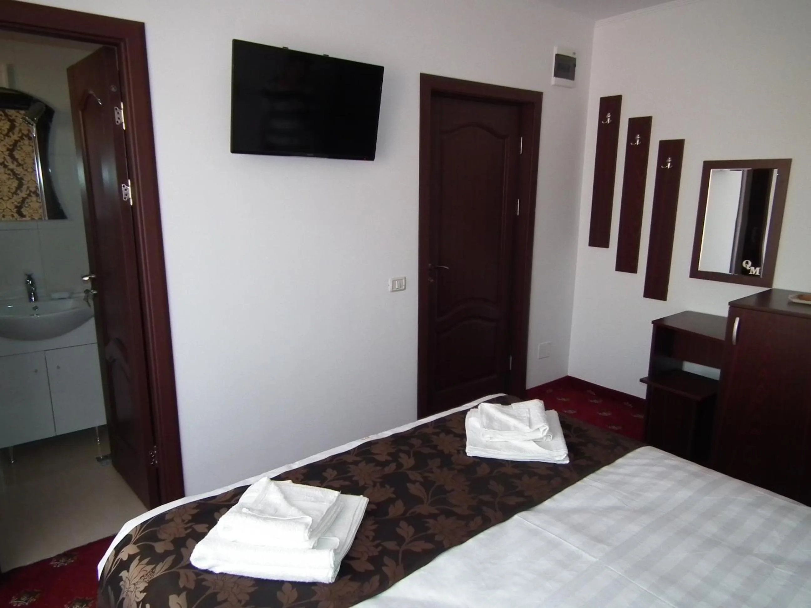 Bed in Vila Queen Mary