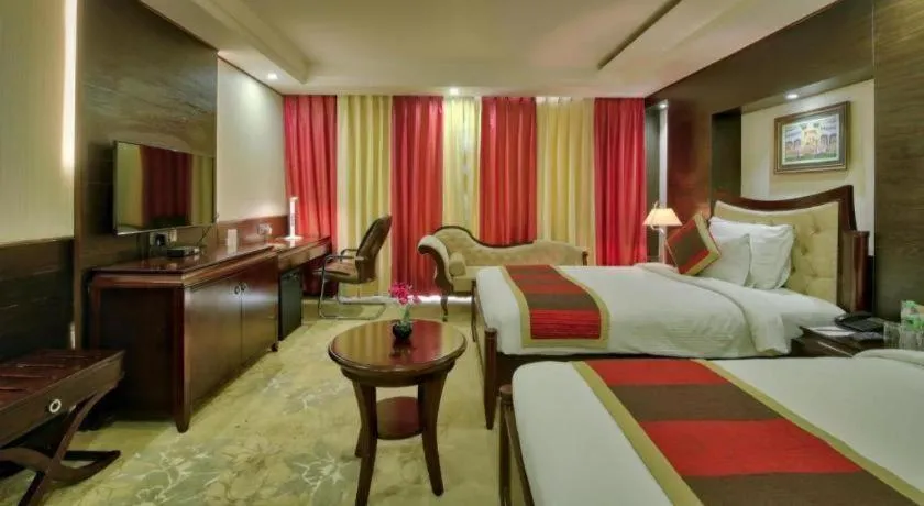 Bed in POLO Inn & Suites