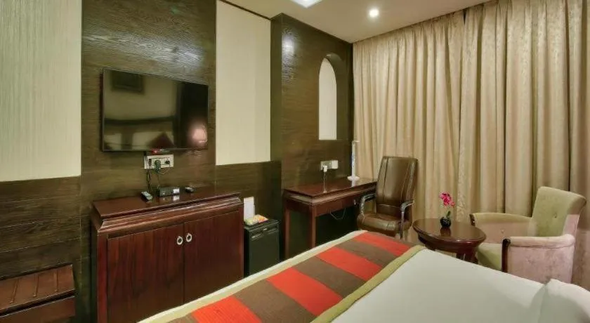 Bed in POLO Inn & Suites