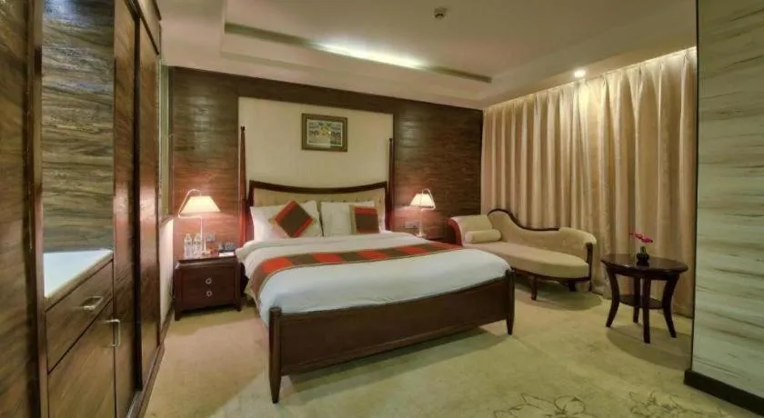 Bed in POLO Inn & Suites