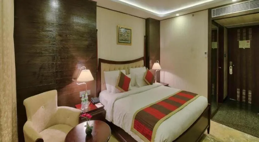 Bed in POLO Inn & Suites