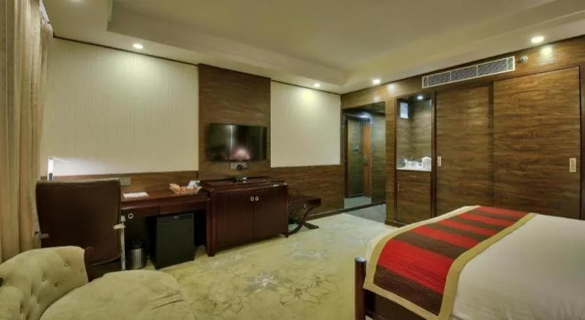 Bed in POLO Inn & Suites