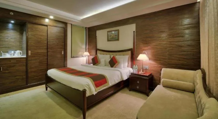 Bed in POLO Inn & Suites