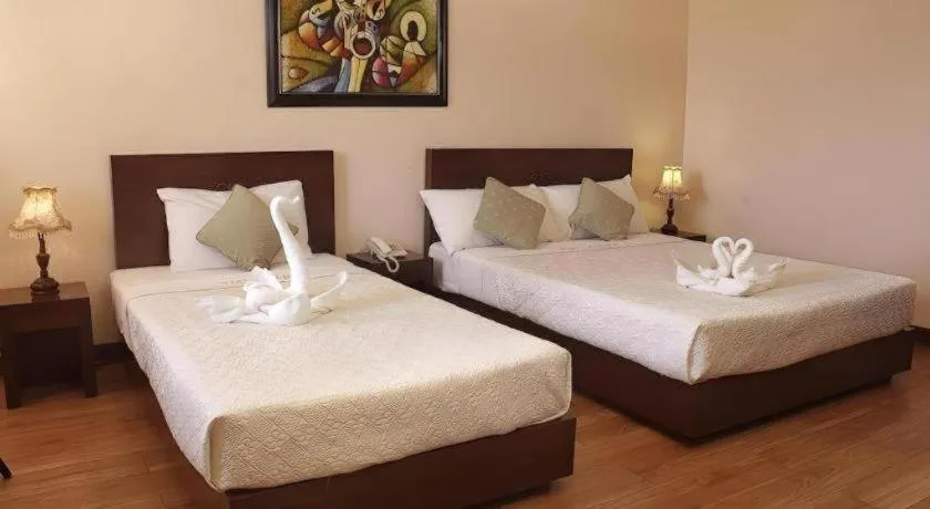 Bed in Vista Marina Hotel and Resort