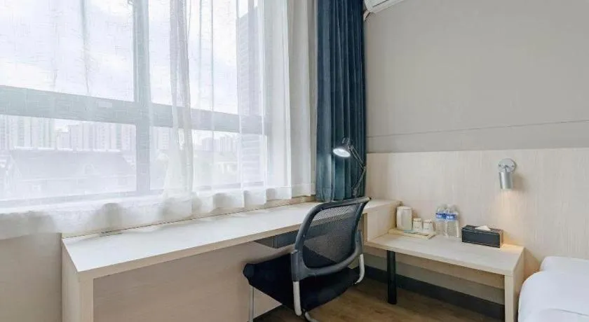 Bed in Jinjiang Inn Shanghai International Tourism and Resorts Zone Kangxin Highway Branch