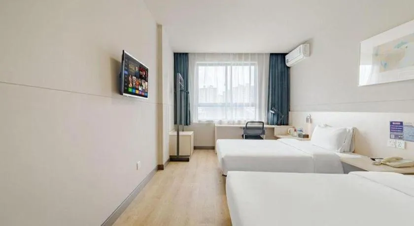 Bed in Jinjiang Inn Shanghai International Tourism and Resorts Zone Kangxin Highway Branch