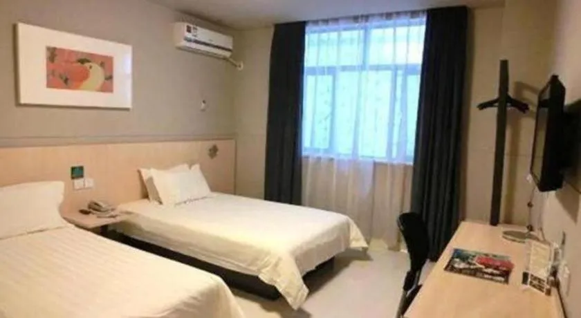 Bed in Jinjiang Inn Shanghai International Tourism and Resorts Zone Kangxin Highway Branch