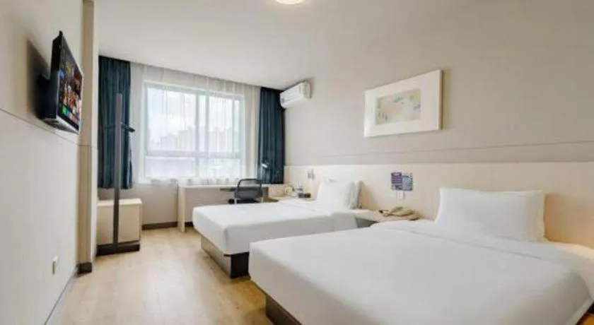 Bed in Jinjiang Inn Shanghai International Tourism and Resorts Zone Kangxin Highway Branch