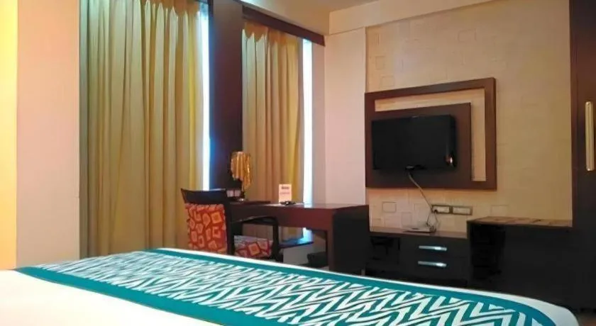 Bed in Hotel Signature Grand