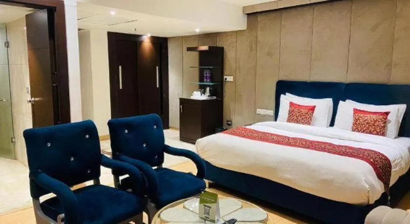 Bed in Hotel Signature Grand