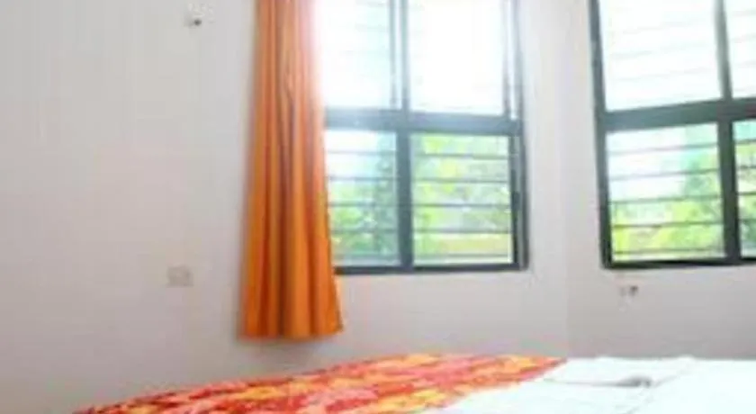 Bed in Poonam Village Resort