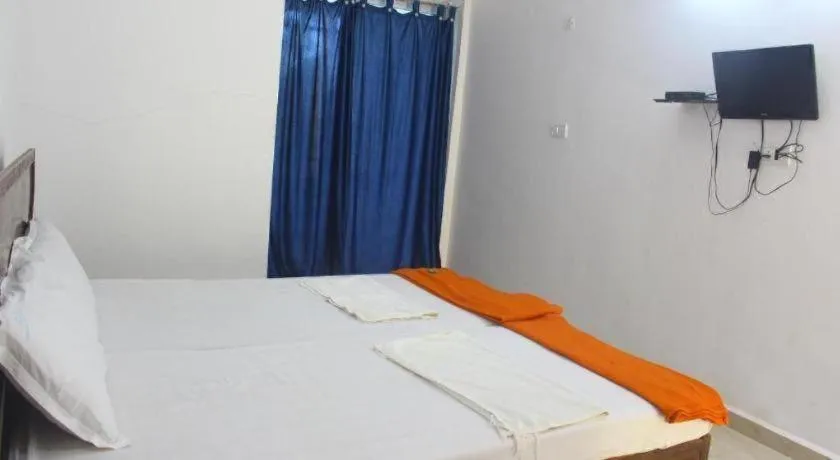 Bed in Poonam Village Resort