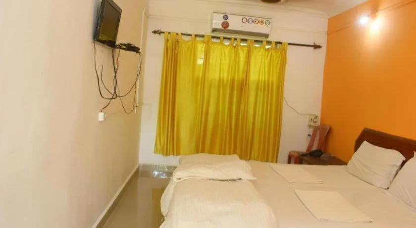 Bed in Poonam Village Resort