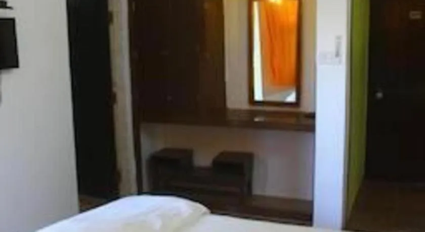 Bed in Poonam Village Resort