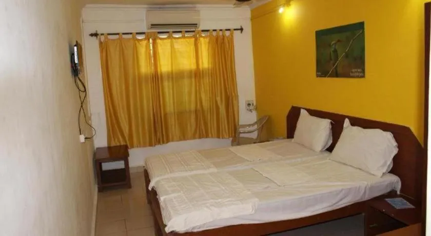 Bed in Poonam Village Resort