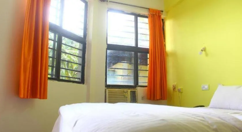 Bed in Poonam Village Resort