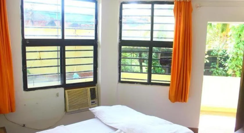 Bed in Poonam Village Resort