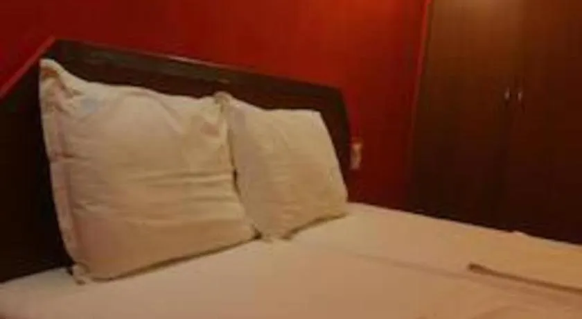 Bed in Poonam Village Resort