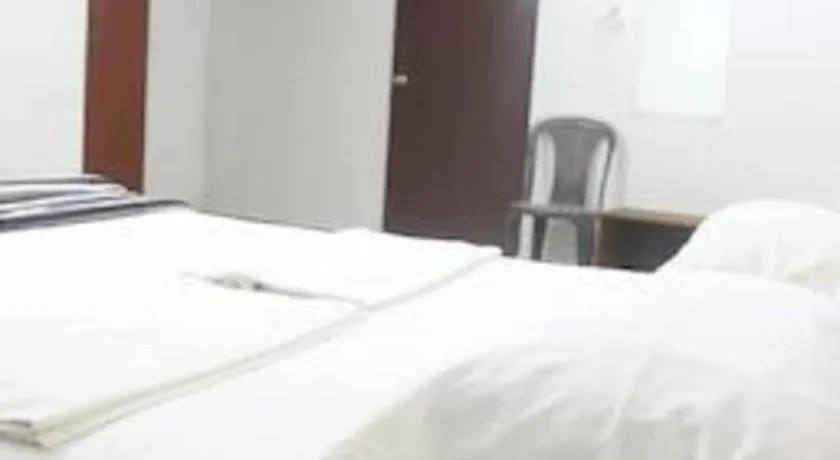 Bed in Poonam Village Resort