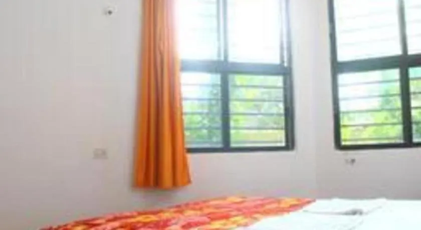 Bed in Poonam Village Resort