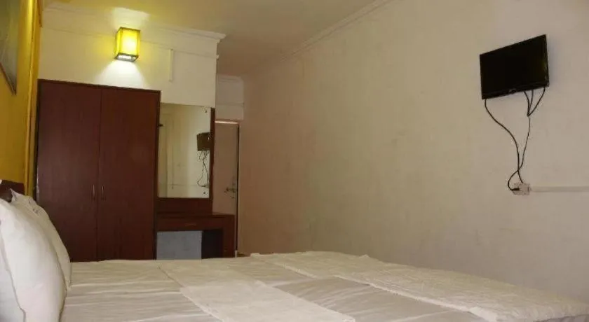 Bed in Poonam Village Resort