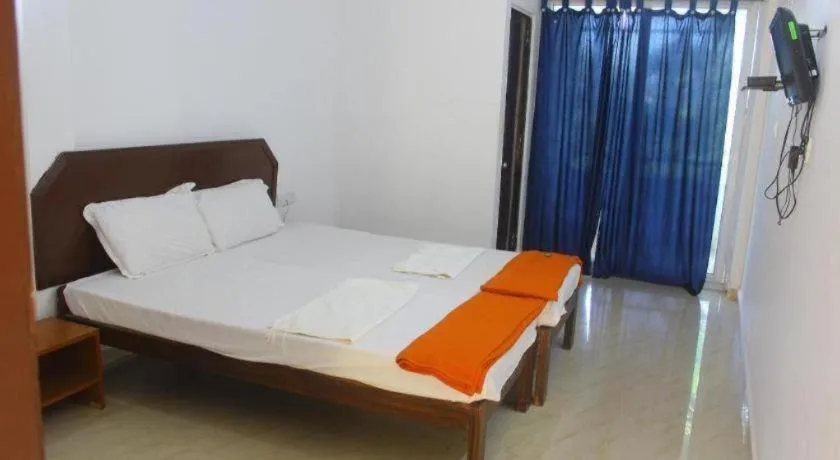 Bed in Poonam Village Resort