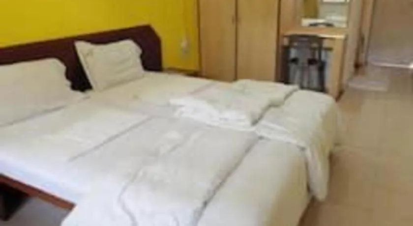 Bed in Poonam Village Resort