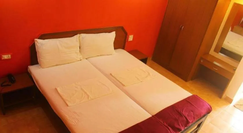 Bed in Poonam Village Resort