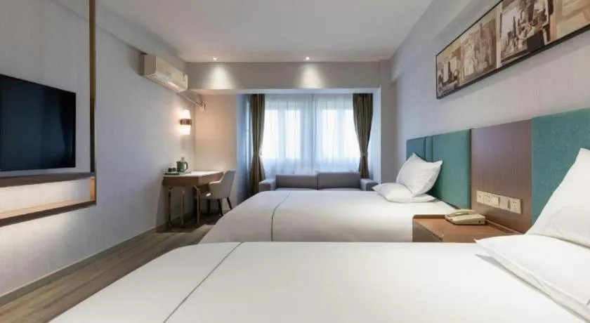 Bed in Jinjiang Inn Tianjin Konggang Branch