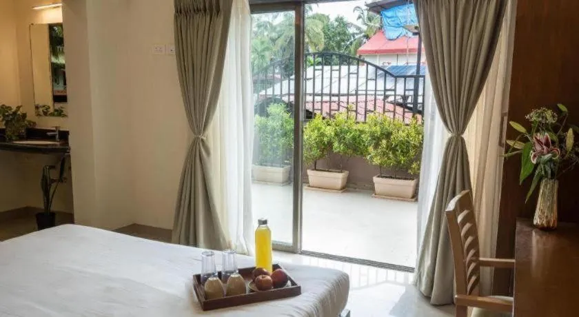 Bed in Palm Air by Goa Signature Stays