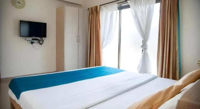 Bed in Palm Air by Goa Signature Stays