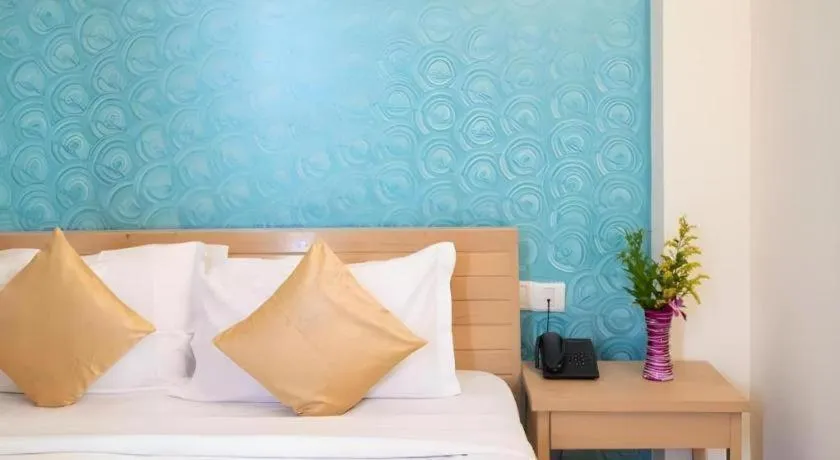 Bed in Palm Air by Goa Signature Stays