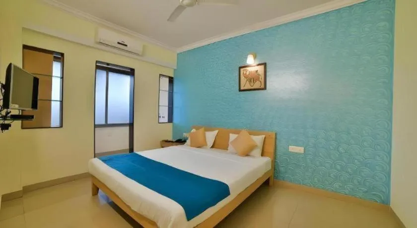 Bed in Palm Air by Goa Signature Stays