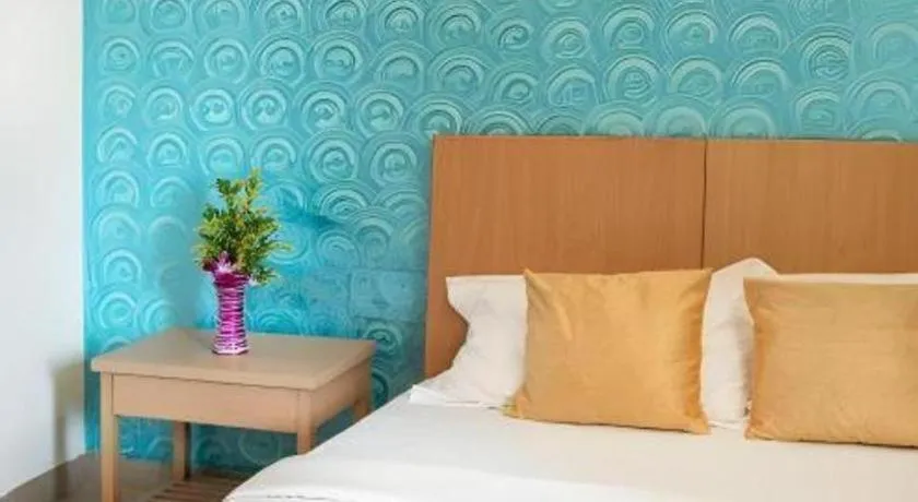 Bed in Palm Air by Goa Signature Stays