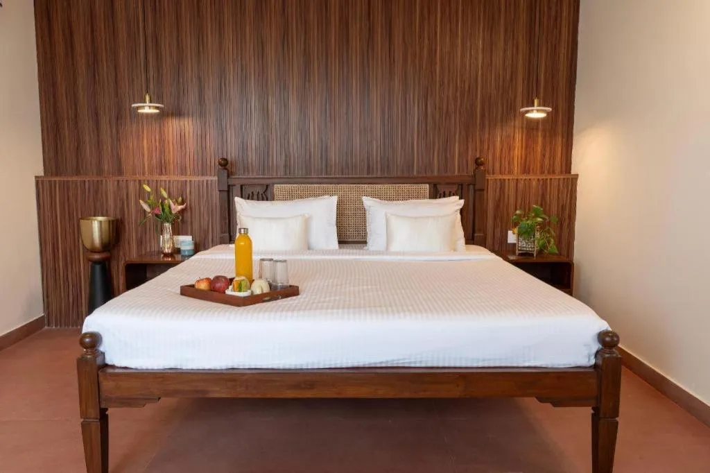 Bed in Palm Air by Goa Signature Stays