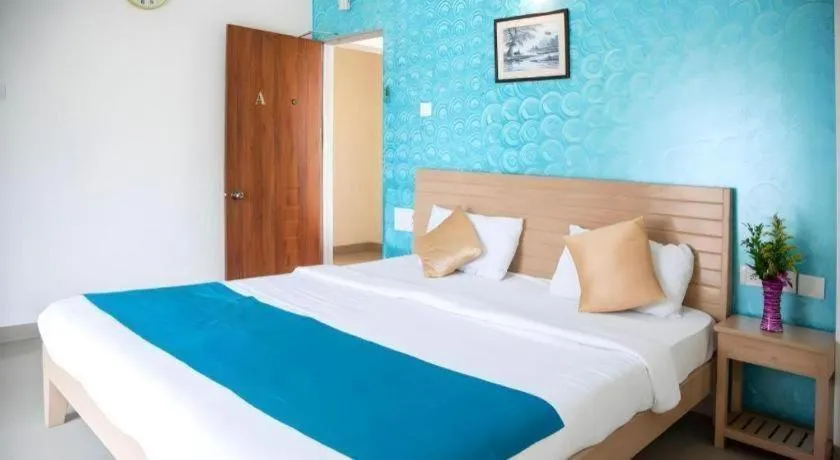 Bed in Palm Air by Goa Signature Stays